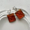 Серебряные массивные серьги с коньячным янтарем с вкраплениями