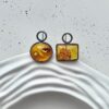 Серебряные геометрические серьги с прозрачным янтарем