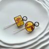 Серебряные геометрические серьги с прозрачным янтарем