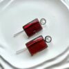 Серебряные квадратные серьги с вишневым янтарем