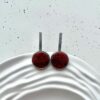 Серебряные круглые серьги с вишневым янтарем