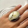 Серебряное большое кольцо с белым пейзажным янтарем