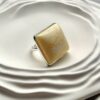 Серебряное большое кольцо с большим белым королевским янтарем