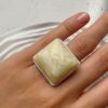 Серебряное большое кольцо с большим белым королевским янтарем