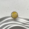 Серебряное круглое кольцо с пейзажным медовым янтарем