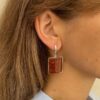 Серебряные массивные серьги с коньячным янтарем с вкраплениями